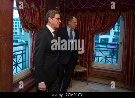 German Foreign Minister Guido Westerwelle (L) meets his Russian counterpart Sergei Lavrov in Berlin February 26, 2013.  REUTERS/Thomas Peter  (GERMANY  - Tags: POLITICS)