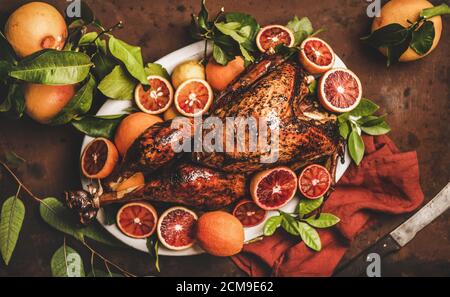Christmas festive table setting with whole roasted turkey Stock Photo