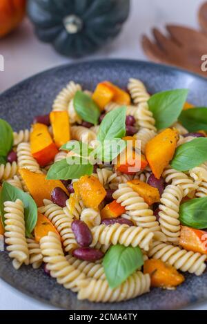 vegan pasta with black beans and pumpkin Stock Photo