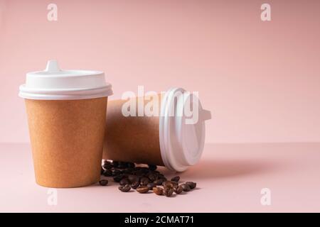 selective focus. paper cups for hot drinks coffee and tea, with a plastic lid, to take away. Copyspace Stock Photo