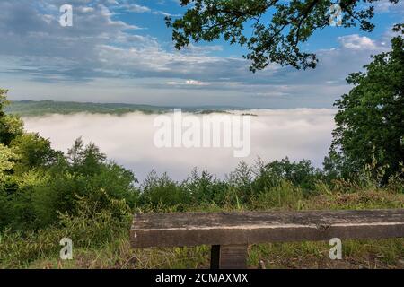 Belgian countryside - Ardennes. View over the Semois valley covered by clouds in the Belgian Ardennes in the early morning. Stock Photo