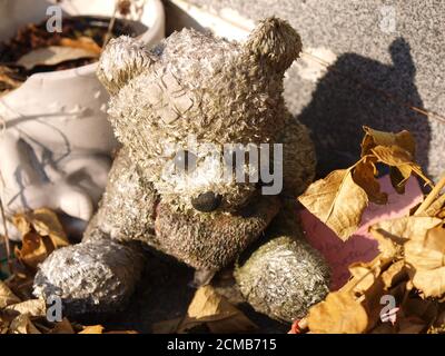Teddy Bear found at a graveside Stock Photo