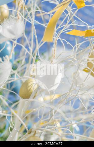 colorfull easter egg tree. brights eggs hanging from branches. Stock Photo