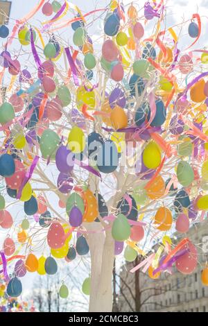 colorfull easter egg tree. brights eggs hanging from branches. Stock Photo