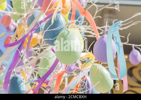 colorfull easter egg tree. brights eggs hanging from branches. Stock Photo