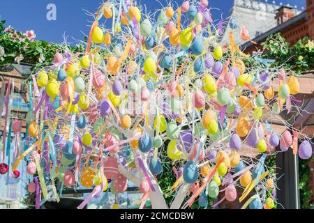 colorfull easter egg tree. brights eggs hanging from branches. Stock Photo