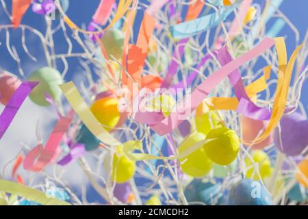 colorfull easter egg tree. brights eggs hanging from branches. Stock Photo
