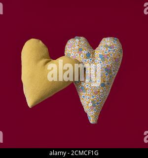 Two red fabric hearts on isolated on white background Stock Photo - Alamy