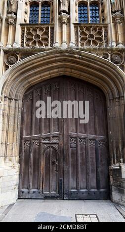 Detail of old heavy wooden door at University of Cambridge Stock Photo