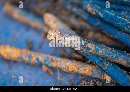 Old metal studs covered in rust, close-up, selective focus Stock Photo