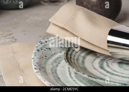 Ceramic stylish tableware set on grey background Stock Photo