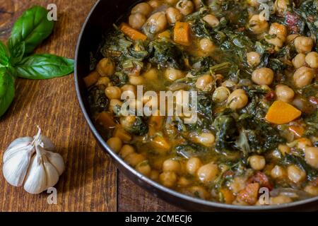 Escarole, endive and chickpeas, vegetarian food Stock Photo