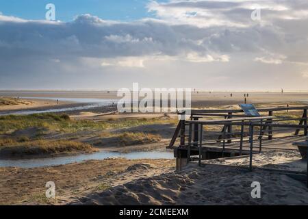 Scenic view of north sea beach in Sankt Peter-Ording, Germany against sky Stock Photo