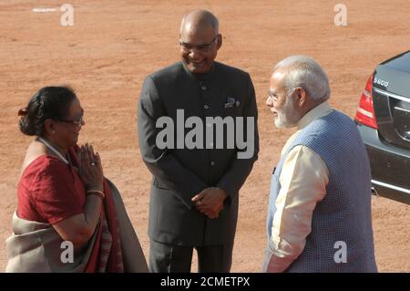 Prime Minister Narendra Modi with President Ramnath Kovind and his wife Savita Kovind in the forecourt of Rashtrapati Bhawan in New Delhi - March 2018 Stock Photo