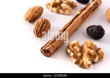 Assortment of nuts and cinnamon isolated on white background Stock Photo