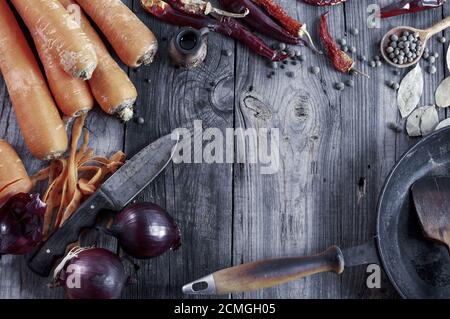 fresh vegetables and spices on gray wooden surface Stock Photo