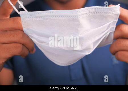 young man wearing protective mask close up  Stock Photo