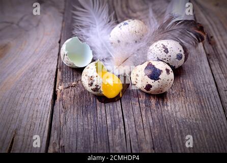 Quail eggs on a wooden surface Stock Photo