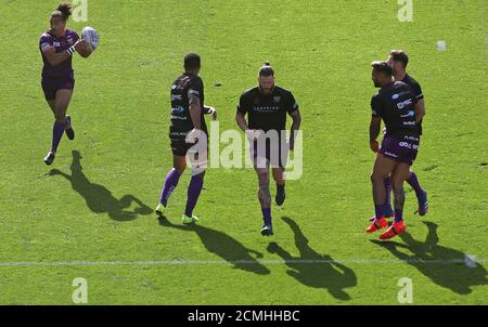Huddersfield Trinity players warm up before the Betfred Super League match at The John Smith's Stadium, Huddersfield. Stock Photo