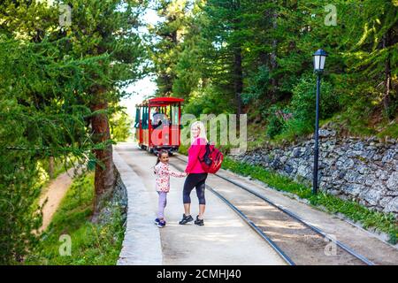 Swiss mountain train crossed Alps, railway in the mountains Stock Photo