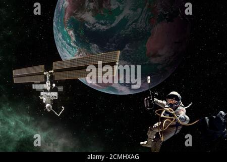 Iss exploration mission with an astronaut next to the earth Elements of this image furnished by NASA Stock Photo