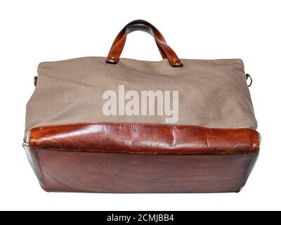 bottom view of handcrafted travel handbag made of leather and canvas tarp isolated on white background Stock Photo