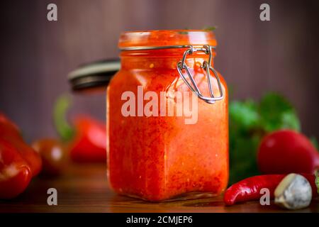 fresh natural homemade sauce made of peppers, tomatoes and other vegetables Stock Photo