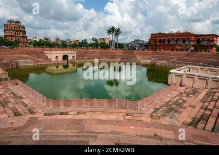Lucknow, India - September 2020: View of the man-made lake between the unfinished Seven Floors Tower and the Hussainabad Picture Gallery in Lucknow on Stock Photo