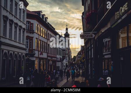 Heidelberg Altstadt: the old town section of Heidelberg, Germany with Heiliggeistkirche in the distance Stock Photo