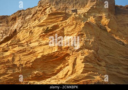 Detail of stratified Middle Pleistocene glacial sands in cliffs on the North Norfolk coast at Happisburgh, Norfolk, England, United Kingdom. Stock Photo