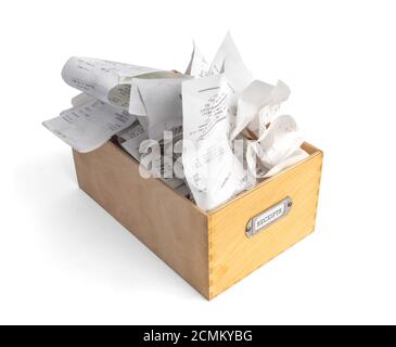 Overfilled box of receipts for filing taxes and deductibles. Wooden storage box with "Receipts" label. Isolated on white. Stock Photo