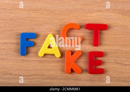 Closeup of words made of plastic letters perfect for the Fact or Fake concept Stock Photo