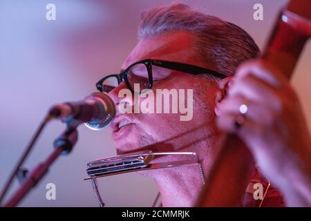 Television presenter and film critic Mark Kermode playing with his band The Dodge Brothers playing at Key West on Bournemouth Pier. The band are: Aly