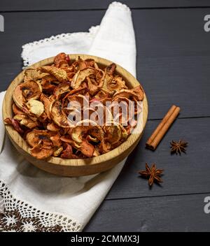 Dried apple slices in an wooden plate Stock Photo