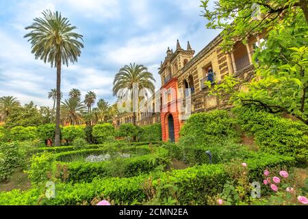 Seville, Andalusia, Spain - April 19, 2016: gardens of Royal Alcazars of Seville, one of great complexes of Spanish courtor, or Reales Alcazares Stock Photo