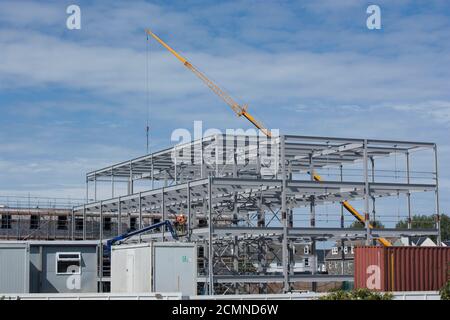 Channel Islands. Guernsey. Admiral Park. Construction site. Steel frame of new commercial building development.