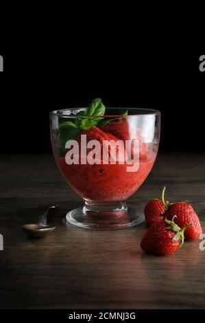 Summer strawberry slushie with basil, Lime and honey, Healthy and refreshing recipe. A delightful al Stock Photo