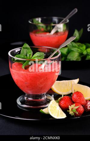 Summer strawberry smoothies with basil, Lime and honey, Healthy and refreshing recipe. A delicious a Stock Photo