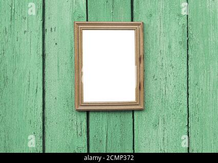empty wooden frame hanging on wooden wall Stock Photo