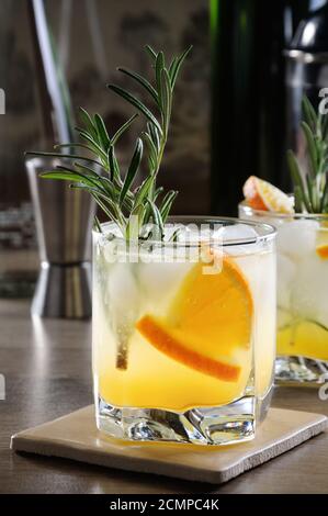 Chilled cocktail of vodka and tonic with the addition of freshly squeezed orange juice Stock Photo