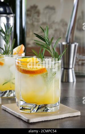 Chilled cocktail of vodka and tonic with the addition of freshly squeezed orange juice Stock Photo