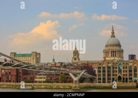 St Pauls and the Millennium Bridge, London, 2019 - The brdge was formerly known as the wobby bridge as it wobbled when walking on it. It is a busy ped Stock Photo