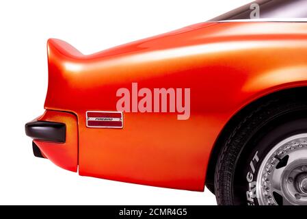 Izmir, Turkey - July 11, 2020: Close up shot of rear mudguard and Side back view of a 1974 Pontiac Brand Trans am firebird in a studio shot. Stock Photo