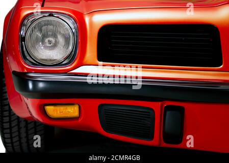 Izmir, Turkey - July 11, 2020: Close-up shot head light of a 1974 Pontiac Brand Trans am firebird in a studio shot. Stock Photo