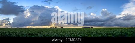 Panorama of storm clouds over the dutch countryside between the cities of Amsterdam and Rotterdam Stock Photo