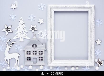 Christmas composition. Photo frame, christmas decorations on gray background. Flat lay, top view, copy space Stock Photo