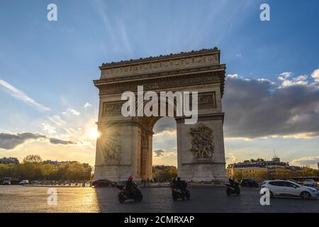Paris France city skyline sunset at Arc de Triomphe and Champs Elysees