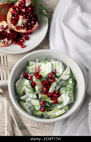 Fresh Cucumber Salad With Dill And Pomegranate Kernels, In Yoghurt 