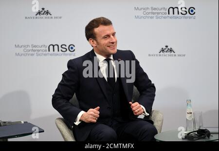 French President Emmanuel Macron reacts during a panel discussion at the annual Munich Security Conference in Germany February 15, 2020. REUTERS/Andreas Gebert