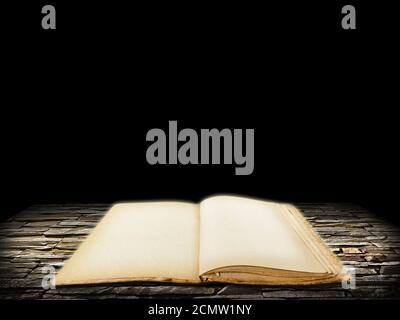Old open book with blank pages on stone grunge background Stock Photo